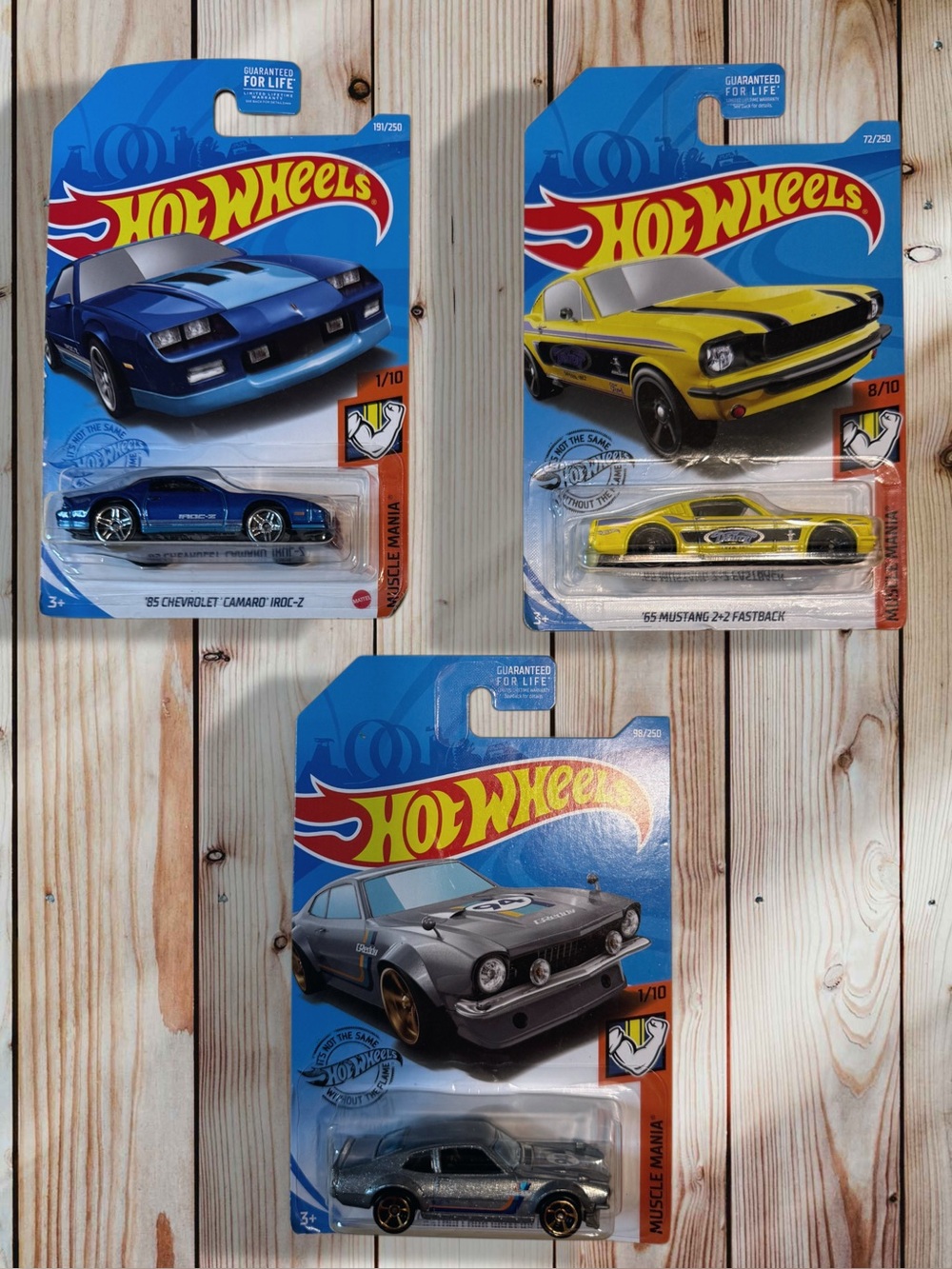 Hot Wheels Muscle Mania Car Bundle: Blue Camaro, Yellow Mustang, Silver Maverick
